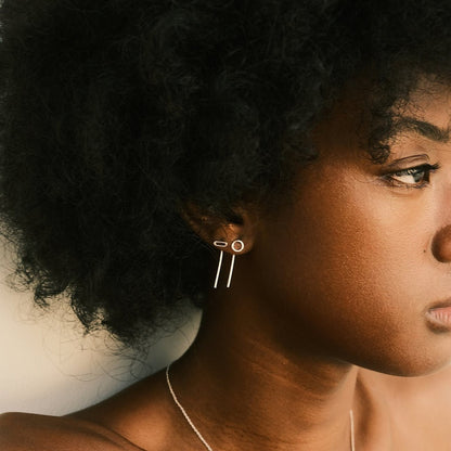 Evidence Stone wears the Silver Carla and Emma Earrings by Aurore Havenne