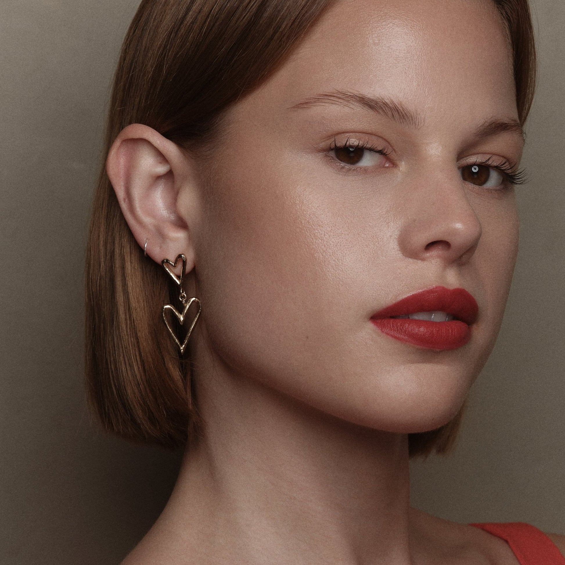 Gold-Plated Silver Double Heart Earrings by Aurore Havenne
