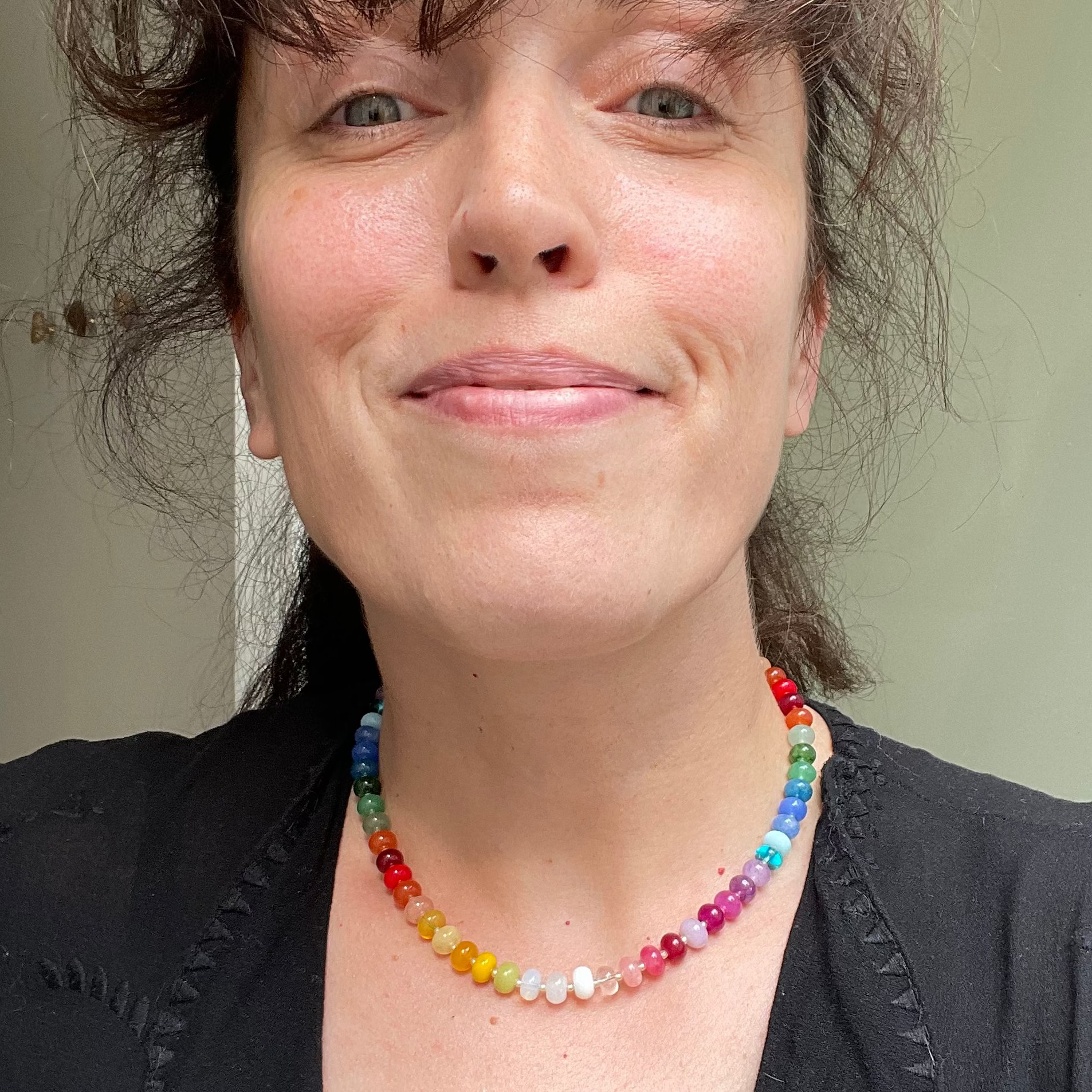 Aurore Havenne wearing her Tutti Frutti necklace made with colourful semi precious stones and glass beads.