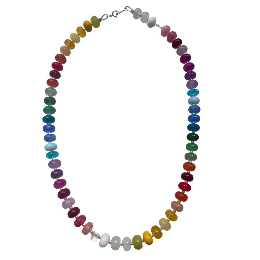 A beaded multicolour necklace made of smooth, polished oval beads in a rainbow sequence, displayed on a clean white background.